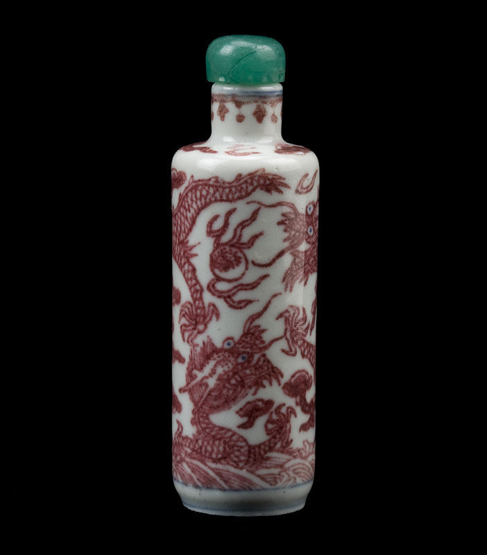 Porcelain snuff bottle with underglaze red dragons and flames