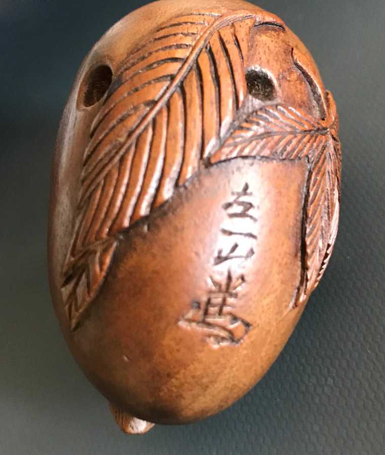 Boxwood netsuke of a tengu no tamago (hatching tengu)