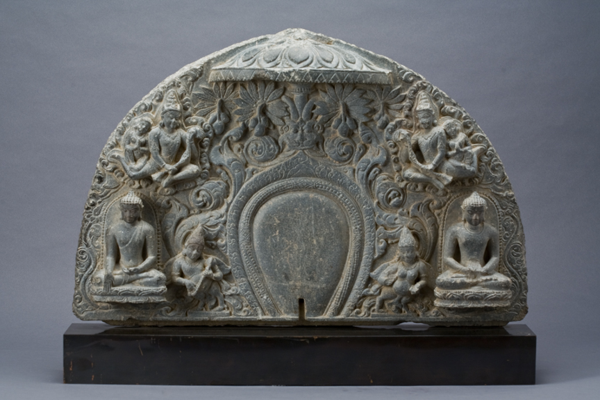 Prabha with two Buddhas on either side and aspara above